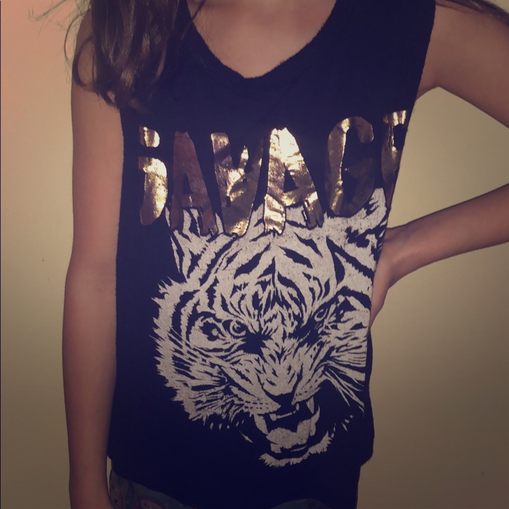 “Savage” tiger shirt.